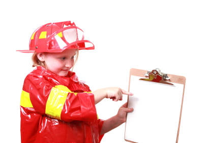 child as firefighter with fire plan