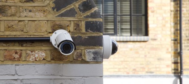 Neighborhood Cameras mounted on exterior wall