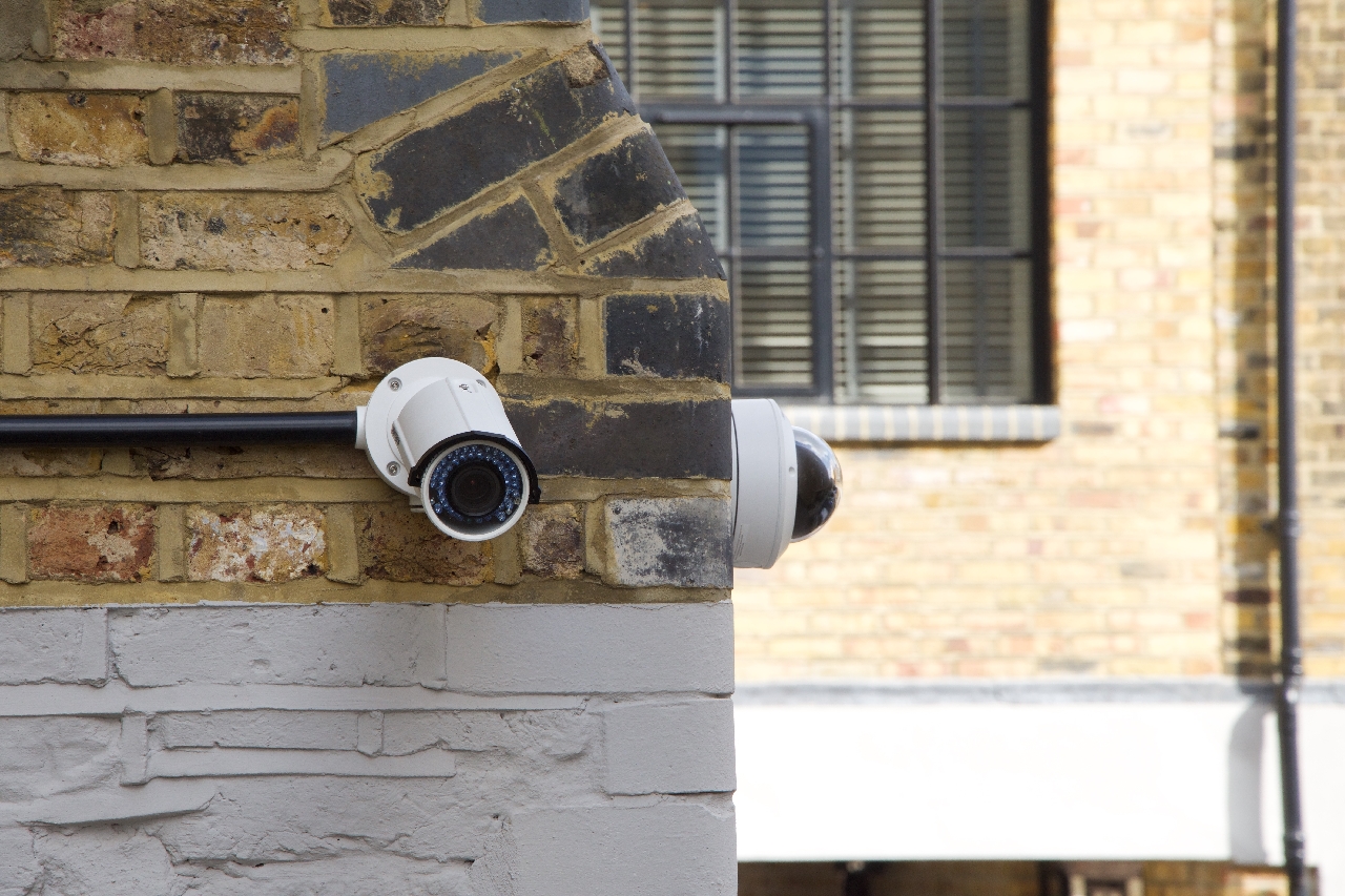 Neighborhood Cameras mounted on exterior wall